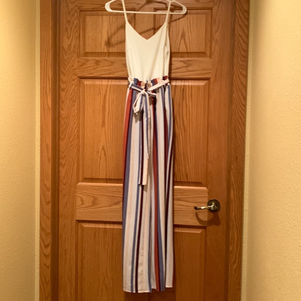 Cream spaghetti strap striped bottom jumpsuit